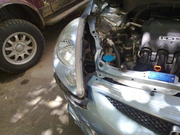 Демонтаж фары Honda Jazz